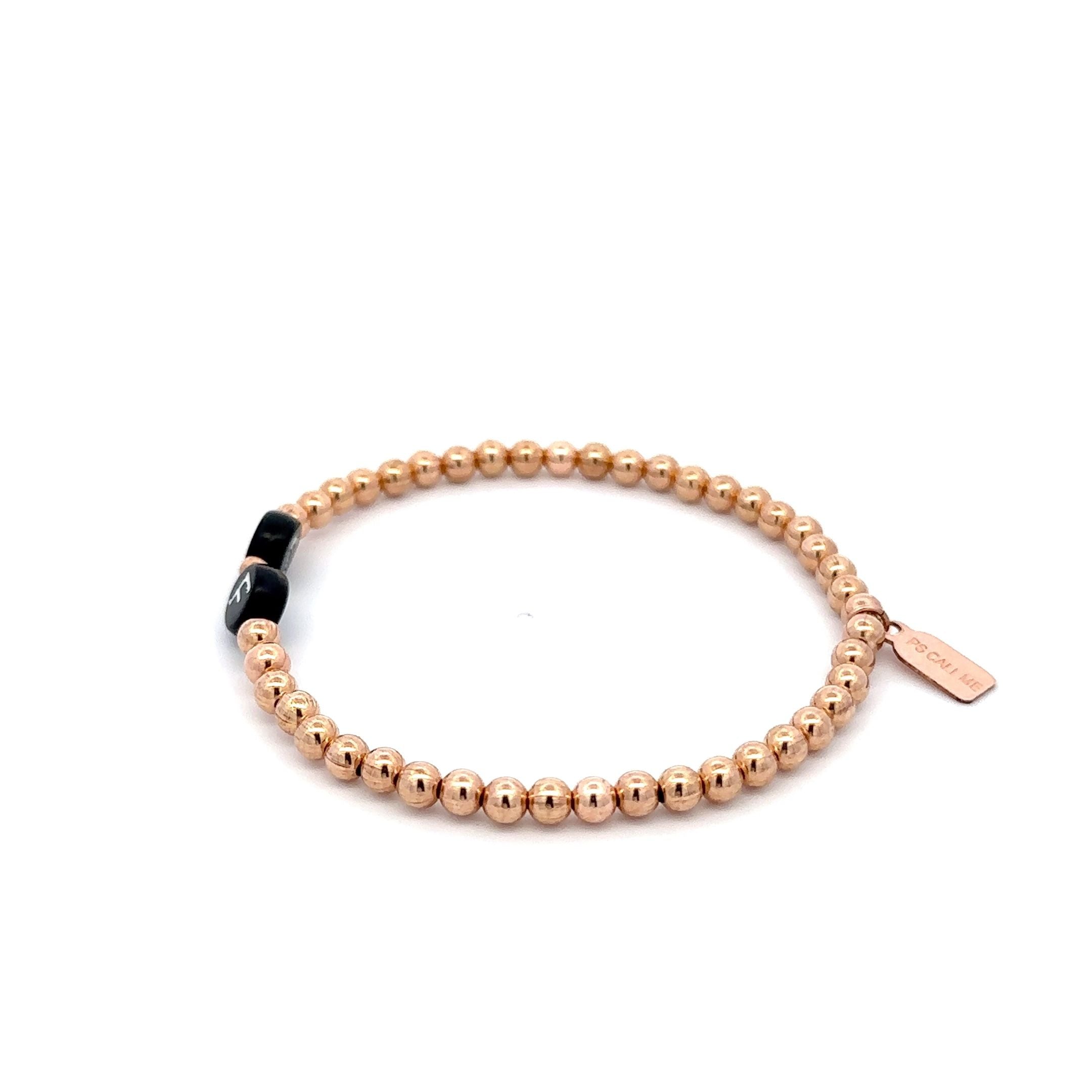 Round initials black rose-gold coloured