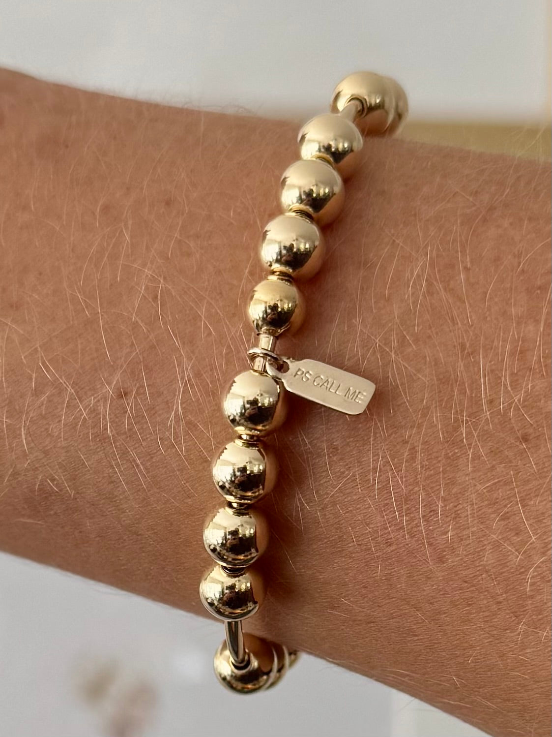 Bangle call me 7mm gold coloured