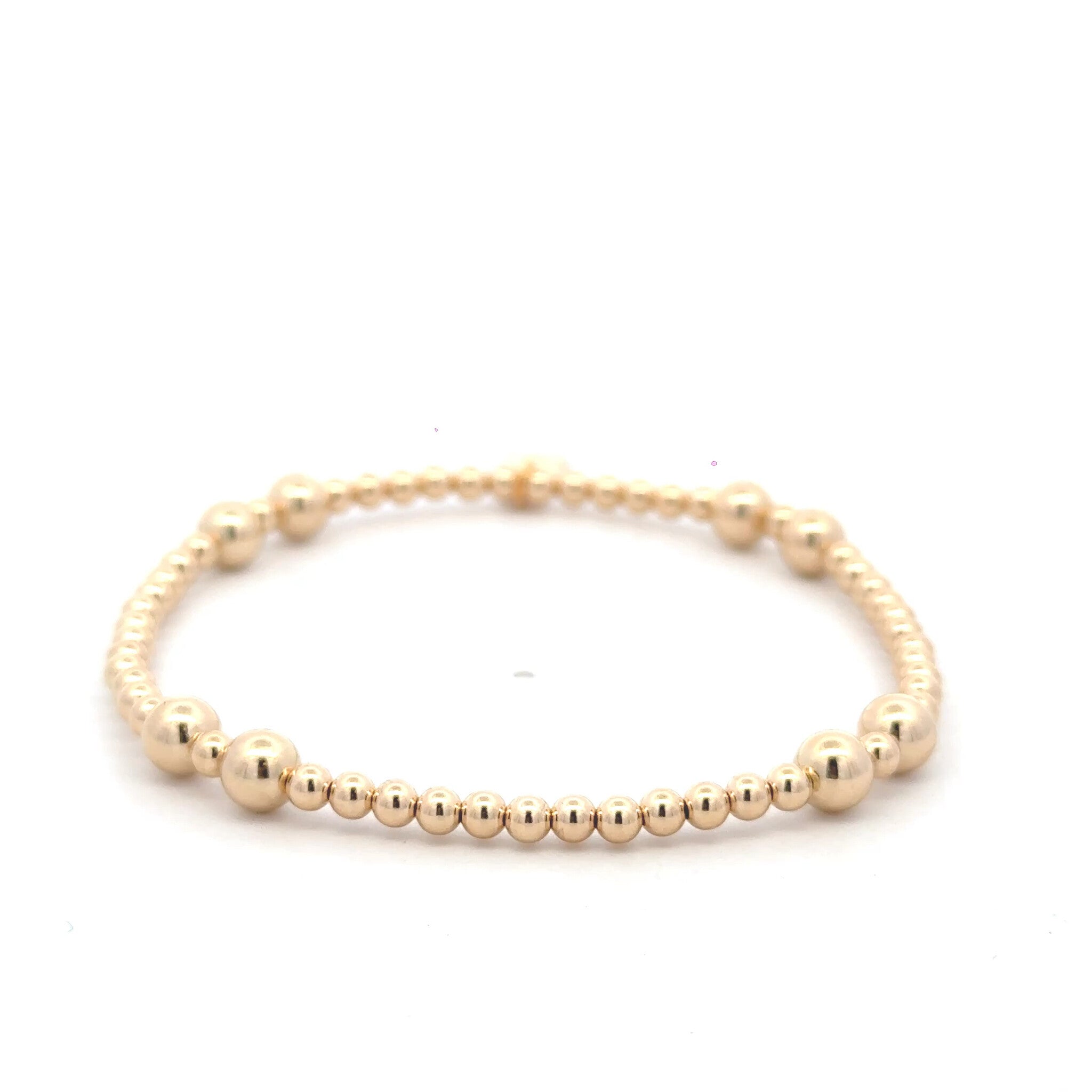 Four split gold coloured