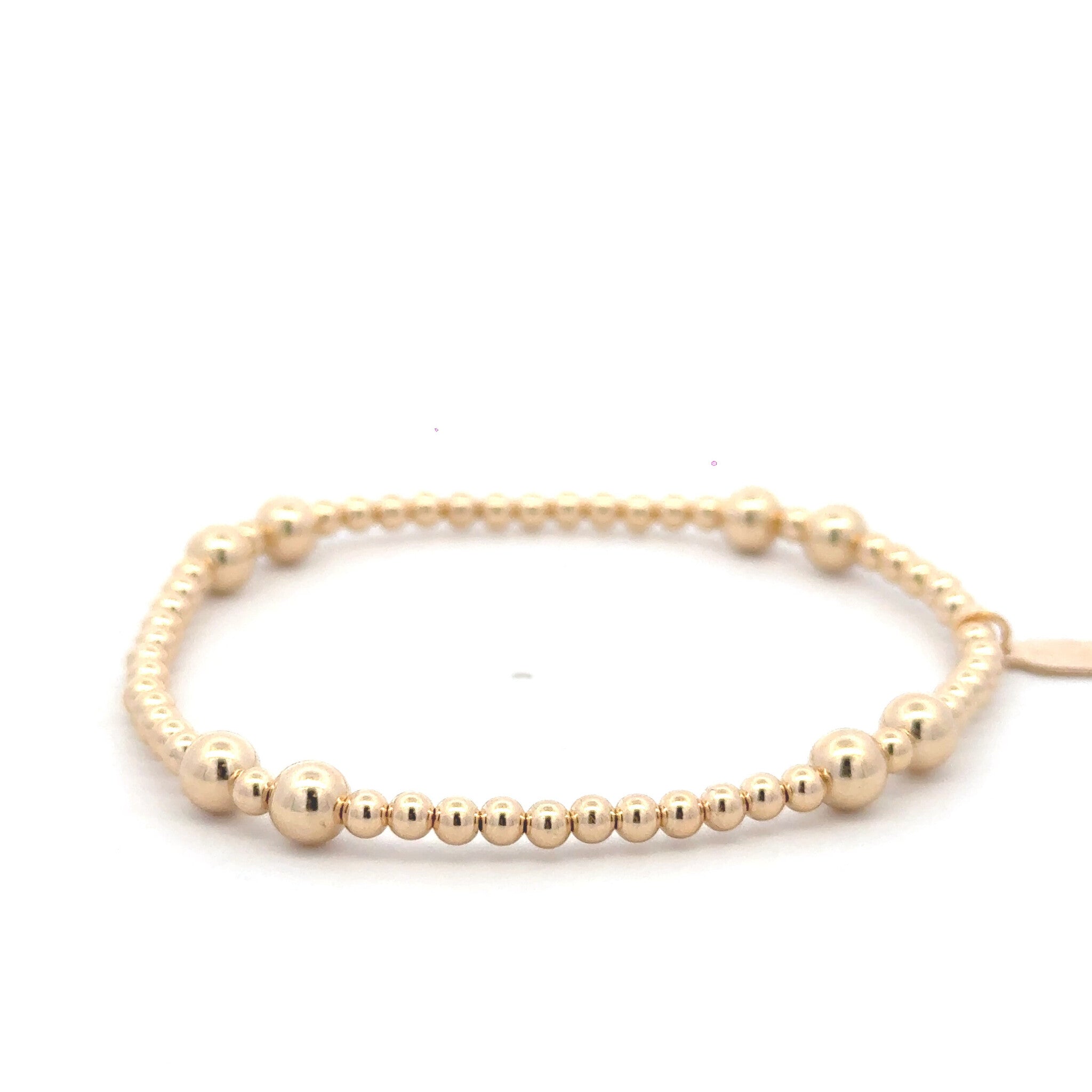 Four split gold coloured