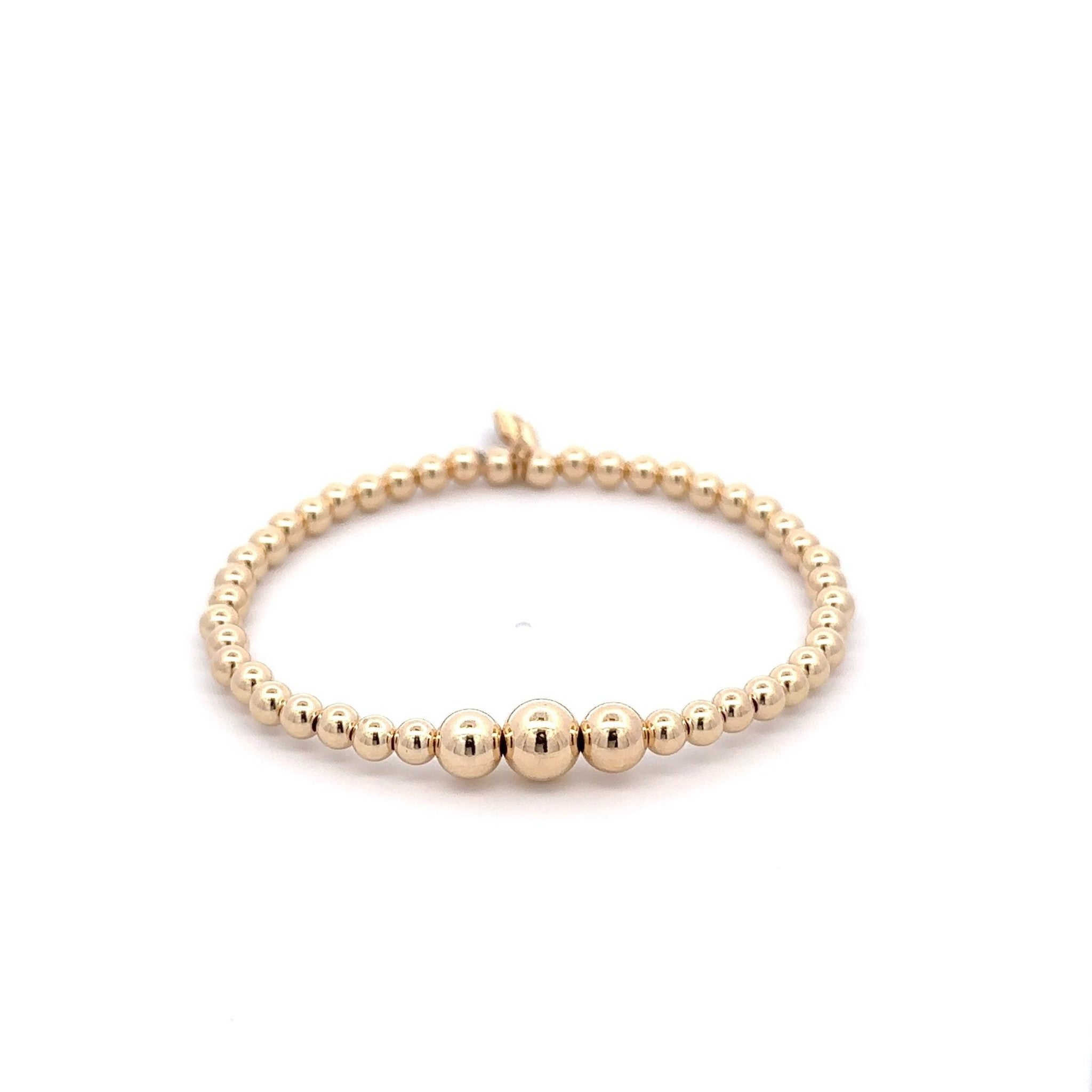 Three gold coloured