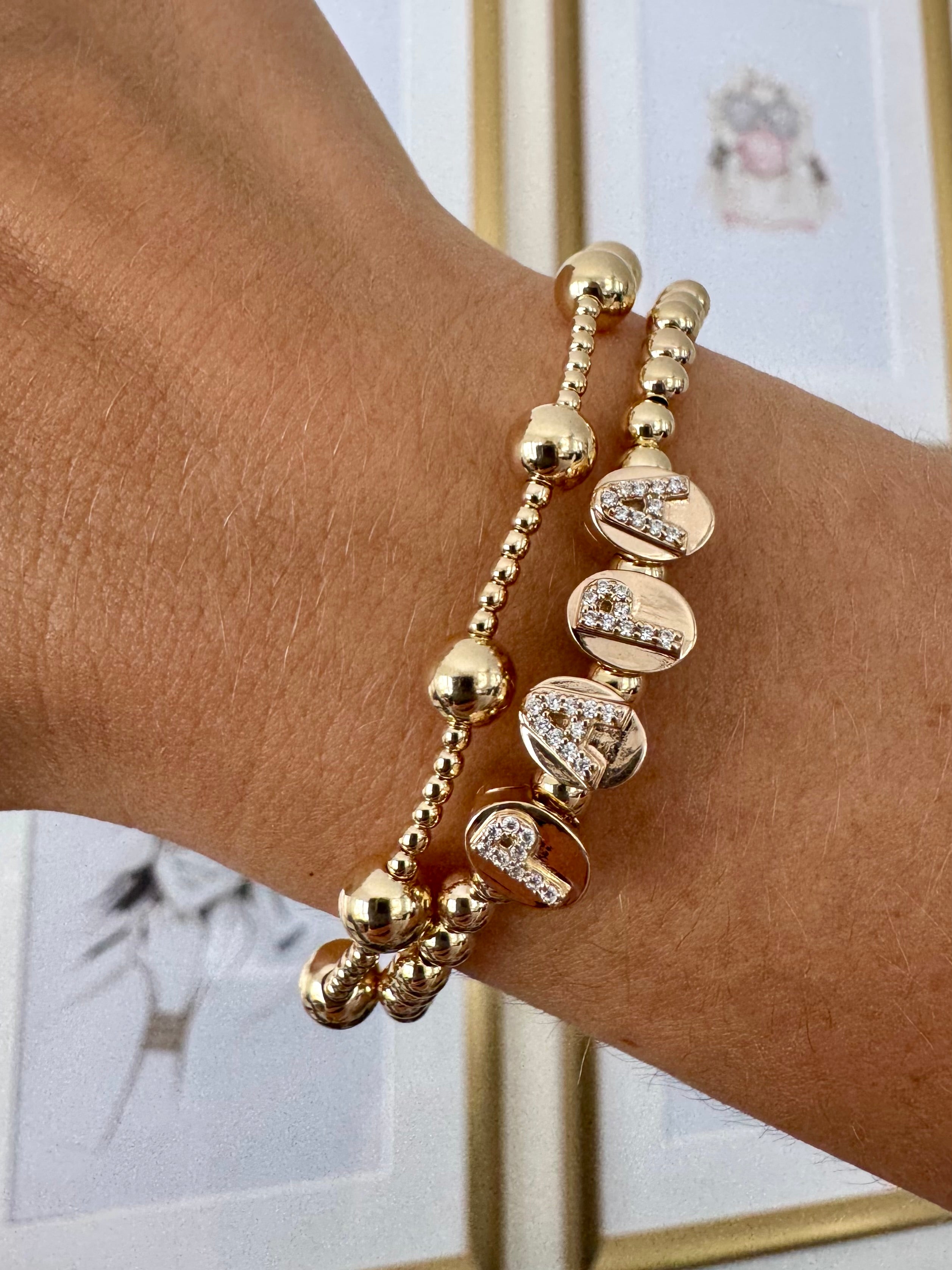 Charm letter click goldplated